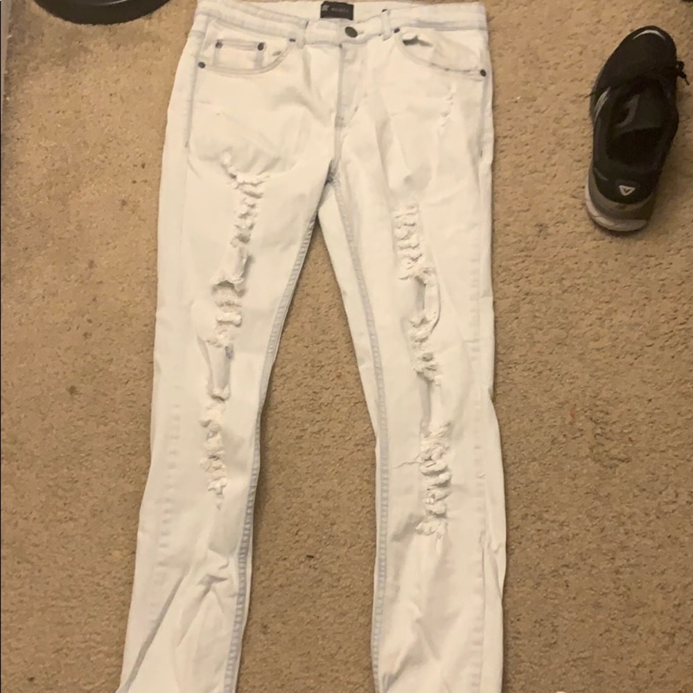 Washed blue ripped jeans